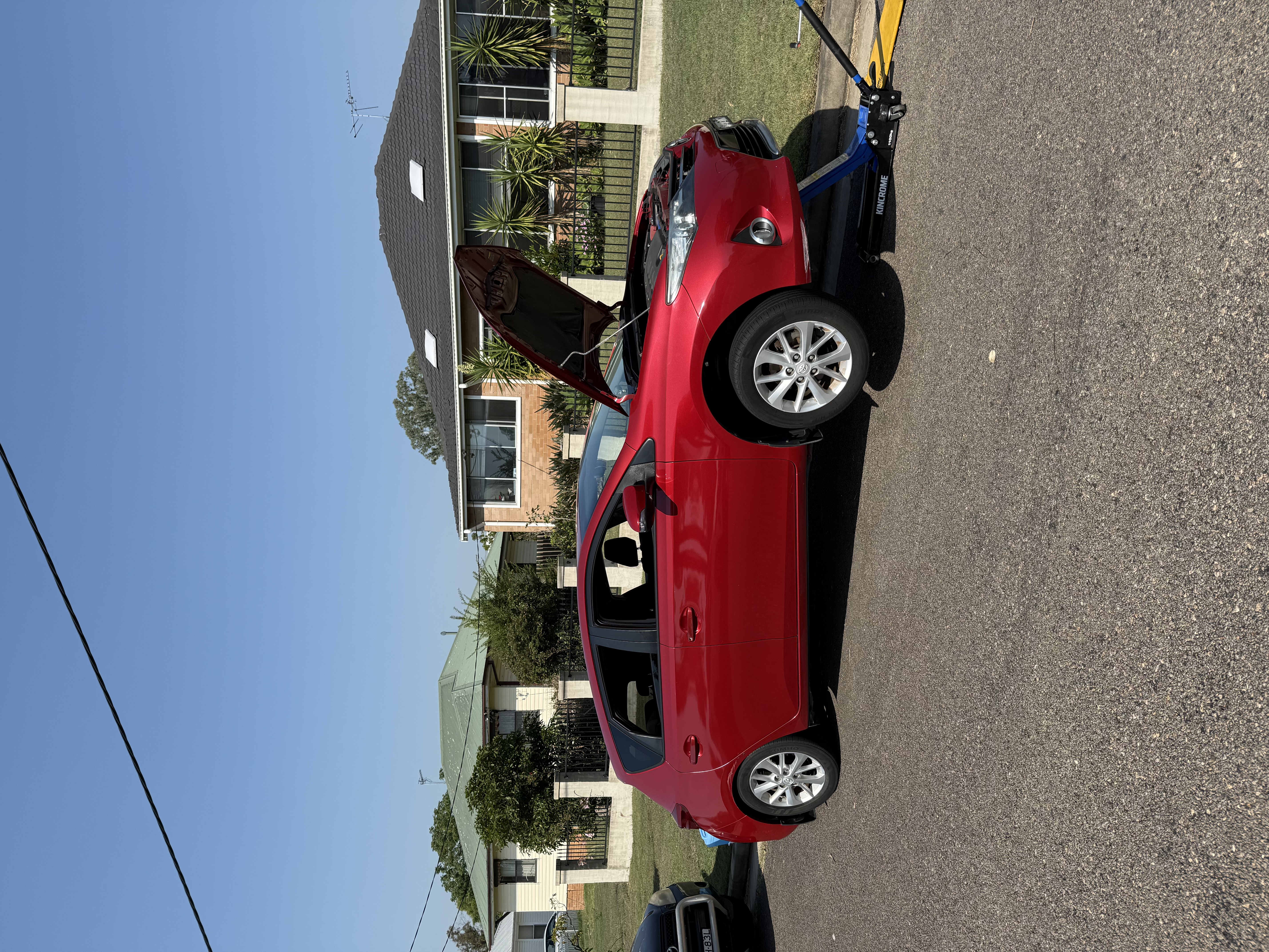 Mechanic inspecting a vehicle during a pre-purchase car inspection - Meek Mobile, Newcastle